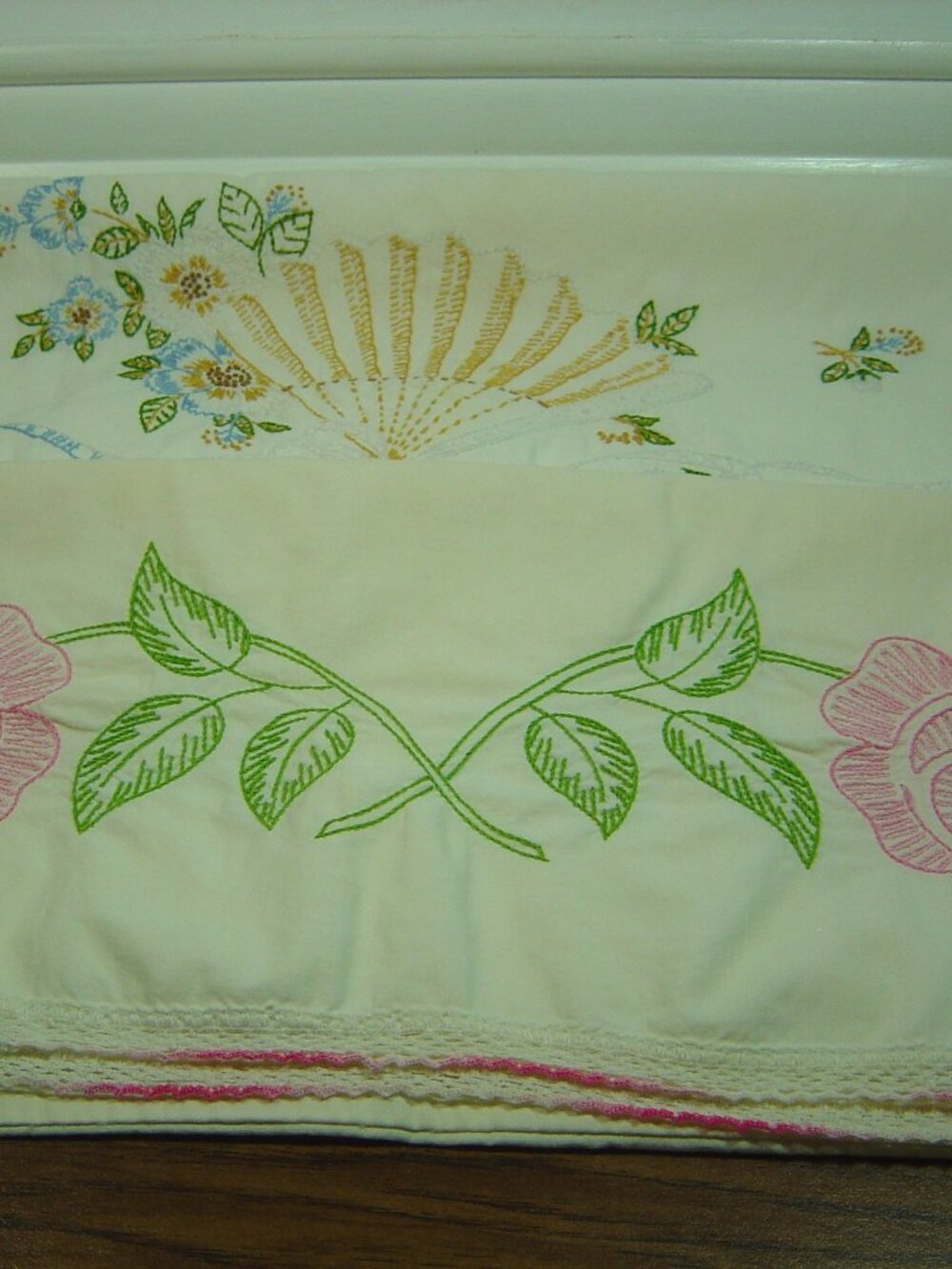 2 vintage embroidered pillowcases-in "as is" condition-selling as cutters